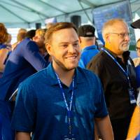 Guests talking to Brian Kelly at the Jamie Hosford Football Center dedication.